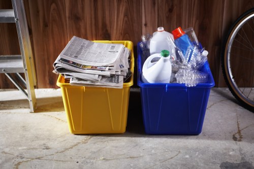 Workers separating recyclables at a transfer station